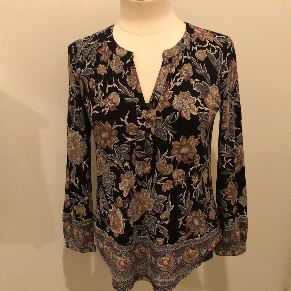 Beautiful patterned blouse.
